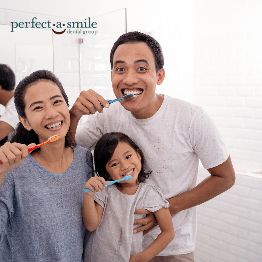 Family brushing teeth